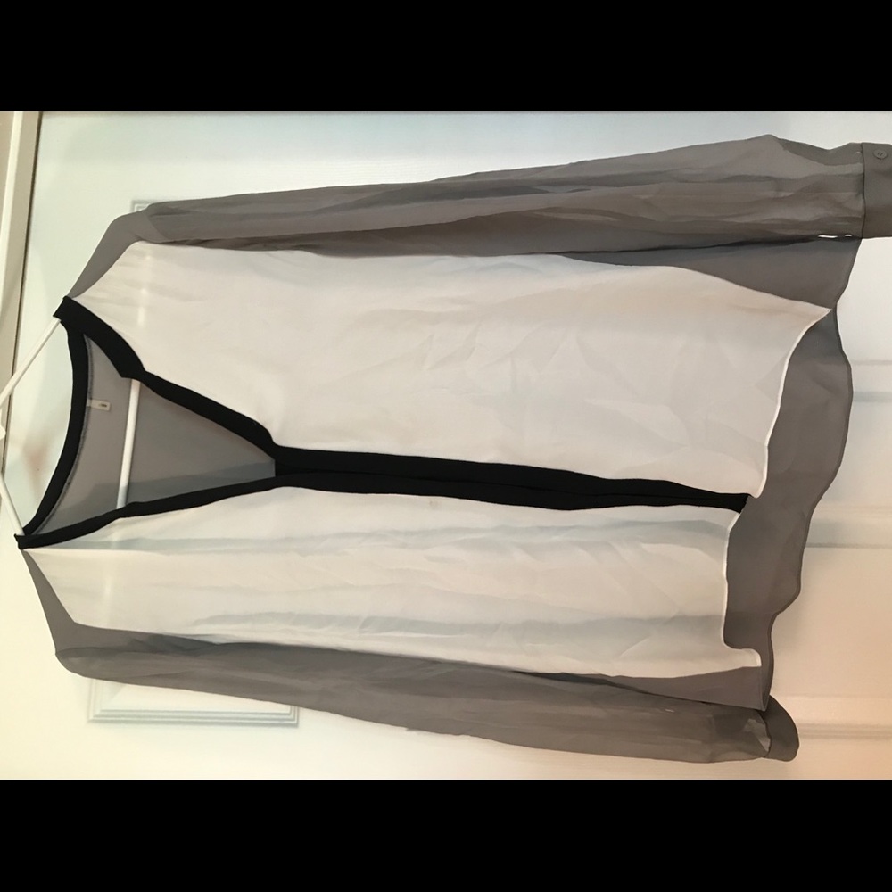 Woman’s long sleeve silk top
